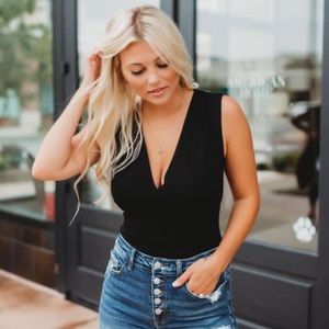 NWOT deep v neck double lined bodysuit